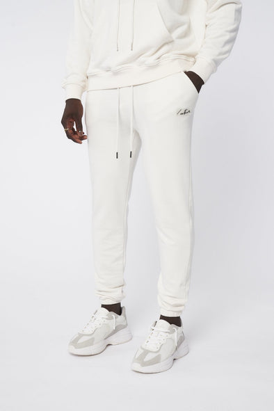 ESSENTIALS RELAXED FIT JOGGER - OFF WHITE