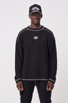 SIGNATURE CIRCLE OVERLOCK RELAXED FIT CREW - BLACK