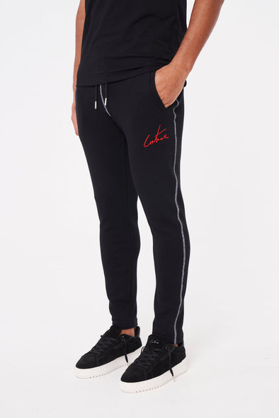 COUTURE SIGNATURE OVERLOCK JOGGERS - BLACK